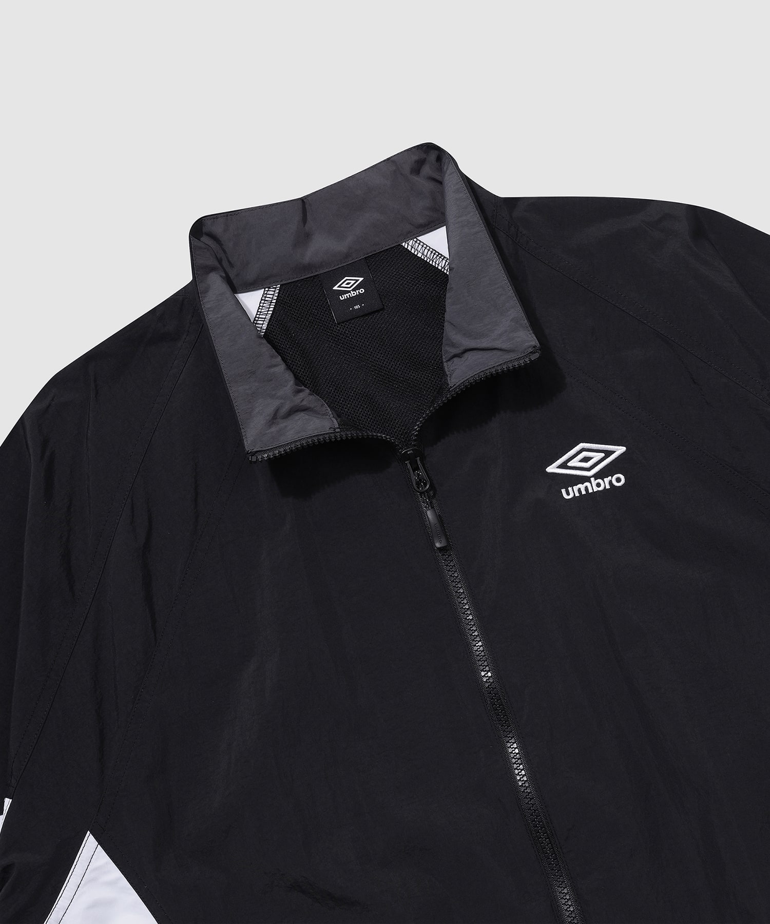 UMBRO 【KOREA COLLECTION】COLOR BLOCK STAND-NECK JACKET ブラックの画像