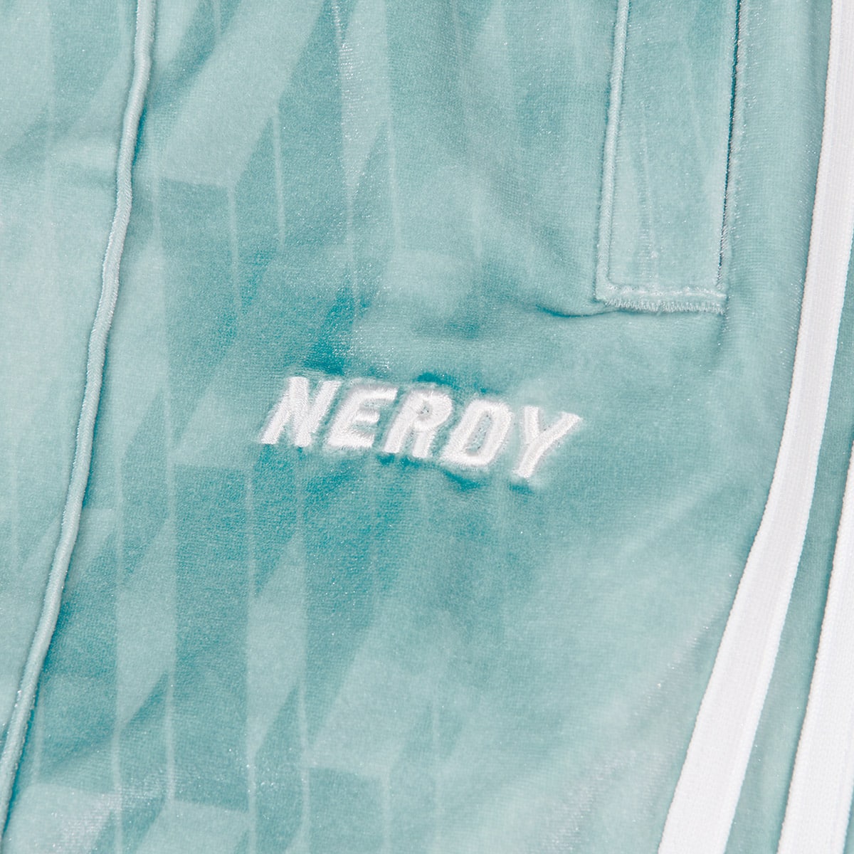 NERDY x atmos pink DNA Watercolor Velvet Track Pants MINTの画像