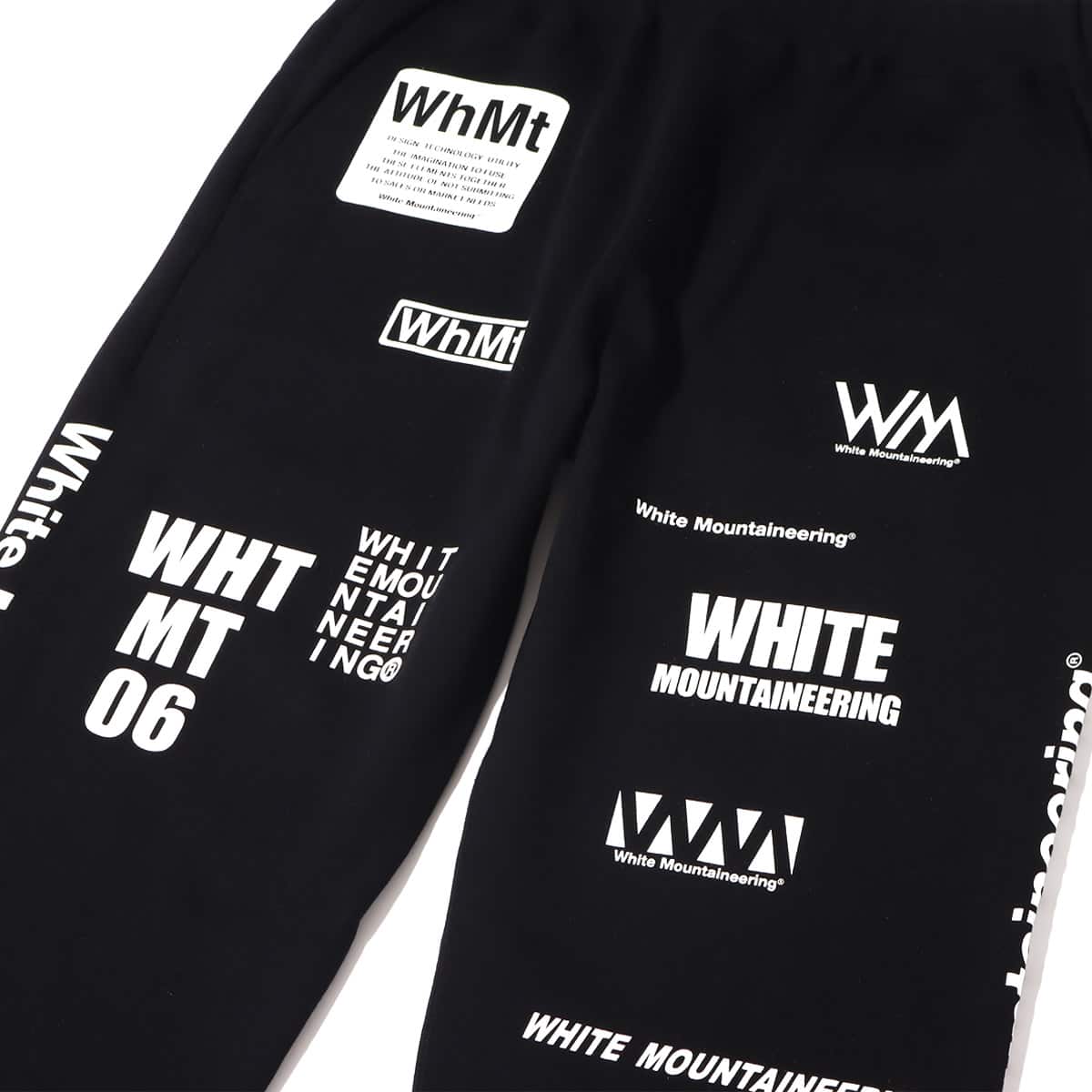 WHITE MOUNTAINEERING WM LOGO RANDAM PRINTED SWEAT PANTS BLACK 21FA-Iの画像