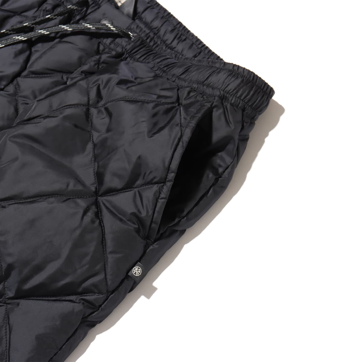 MAGIC NUMBER & THE HEARTBREAKERS × NANGA NYLON QUILTING DOWN PANT BLACK 23FA-Sの画像