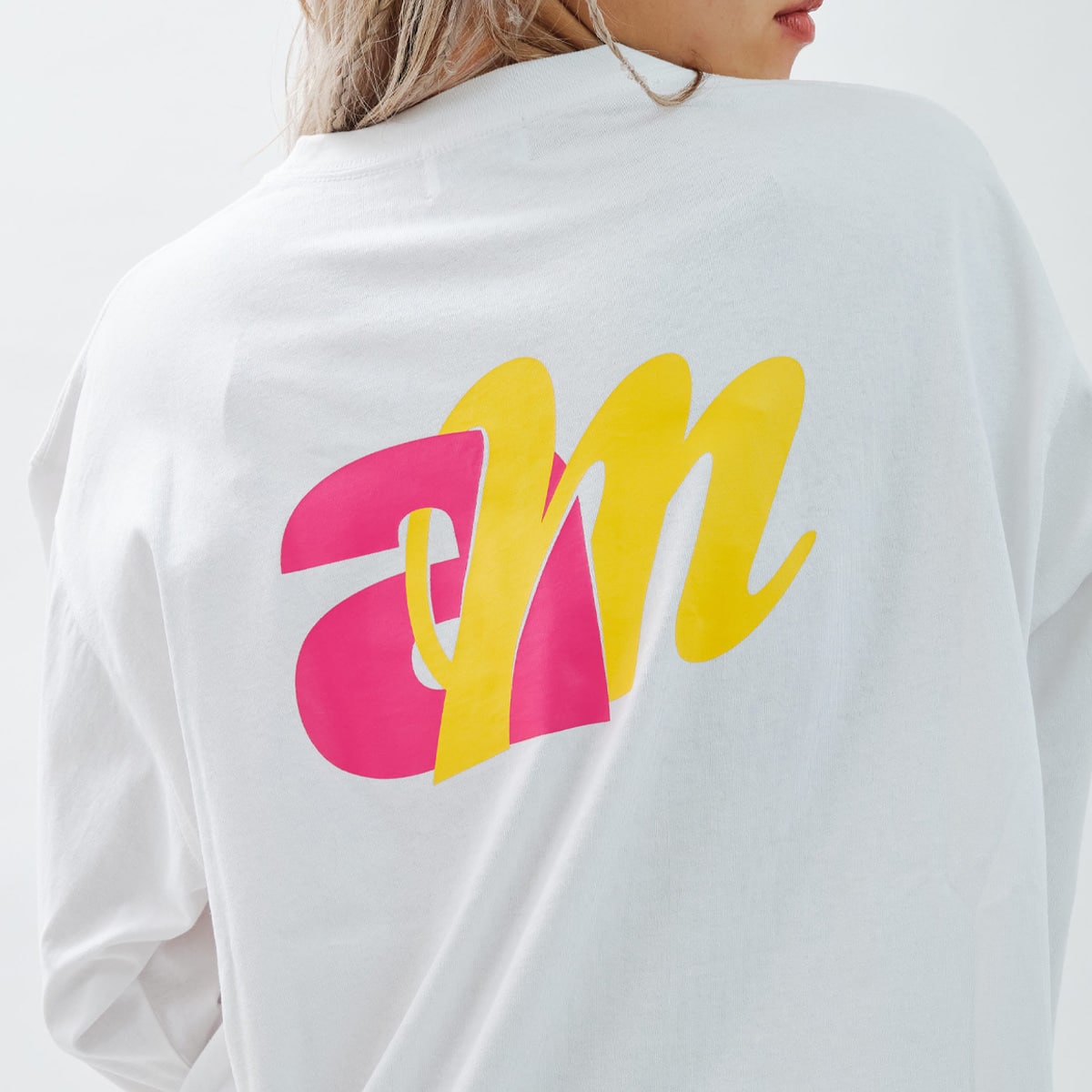 atmos pink x MONICHIKI HOUSE AM Logo L/S T-Shirt WHITEの画像