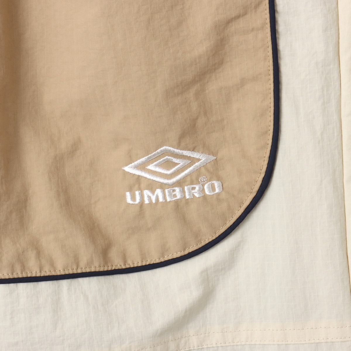 UMBRO × atmos pink Track Pants BEIGEの画像