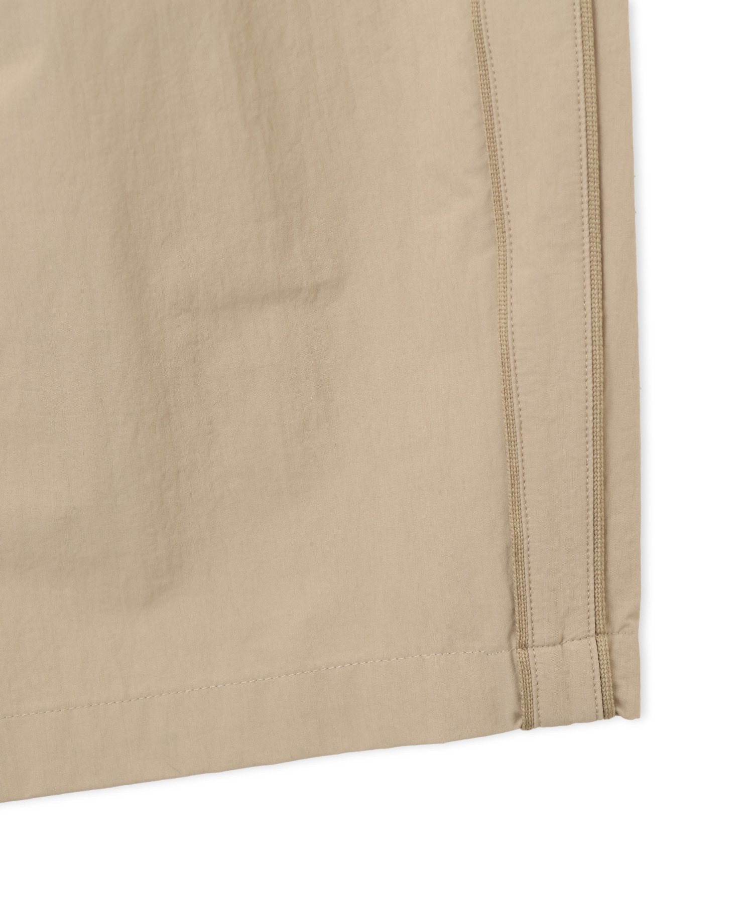 PUMA WASHER WOVEN LONG PANTS ICE COFFEEの画像