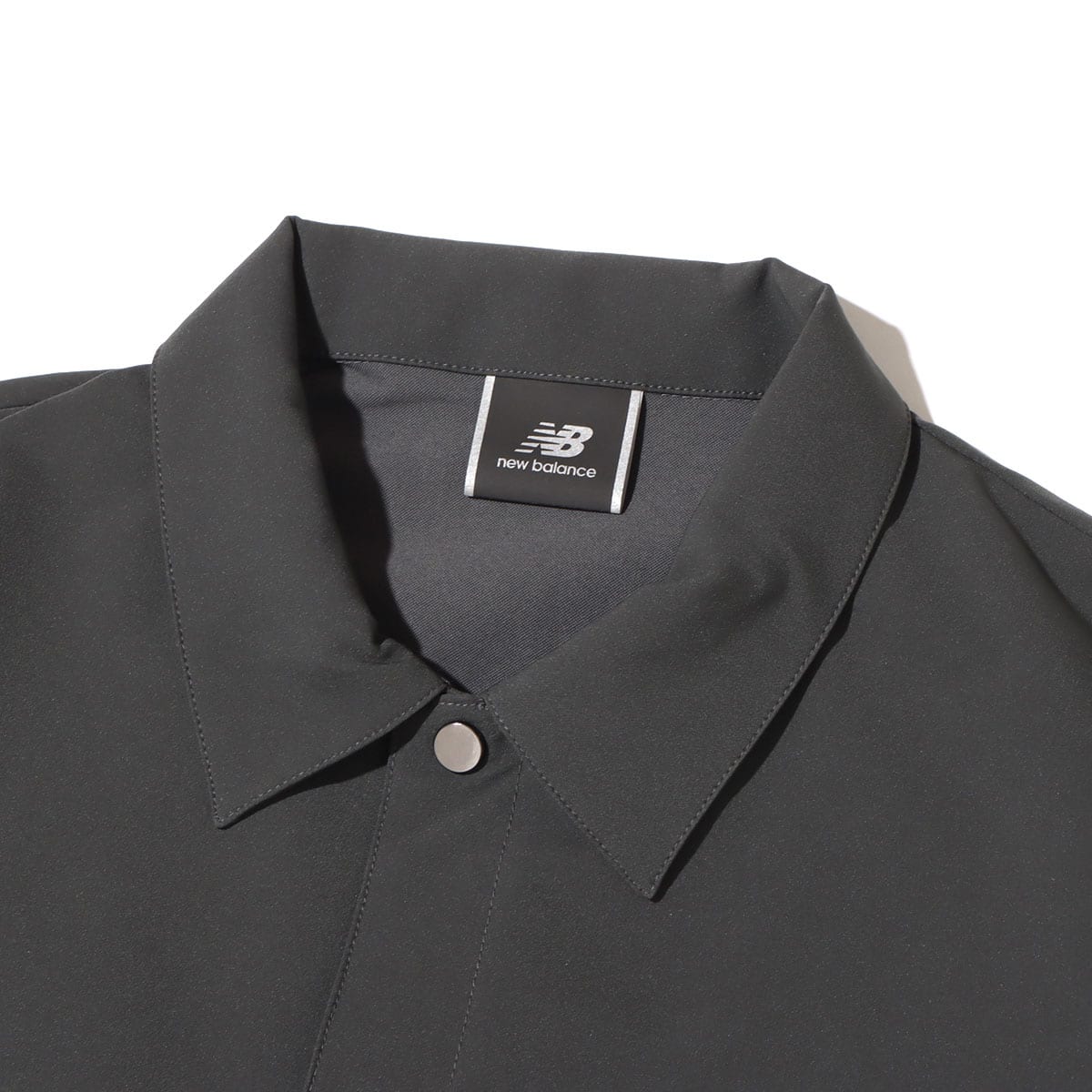 New Balance MET24 Coach Shirt Jacket BLACK TOP 23SS-Sの画像
