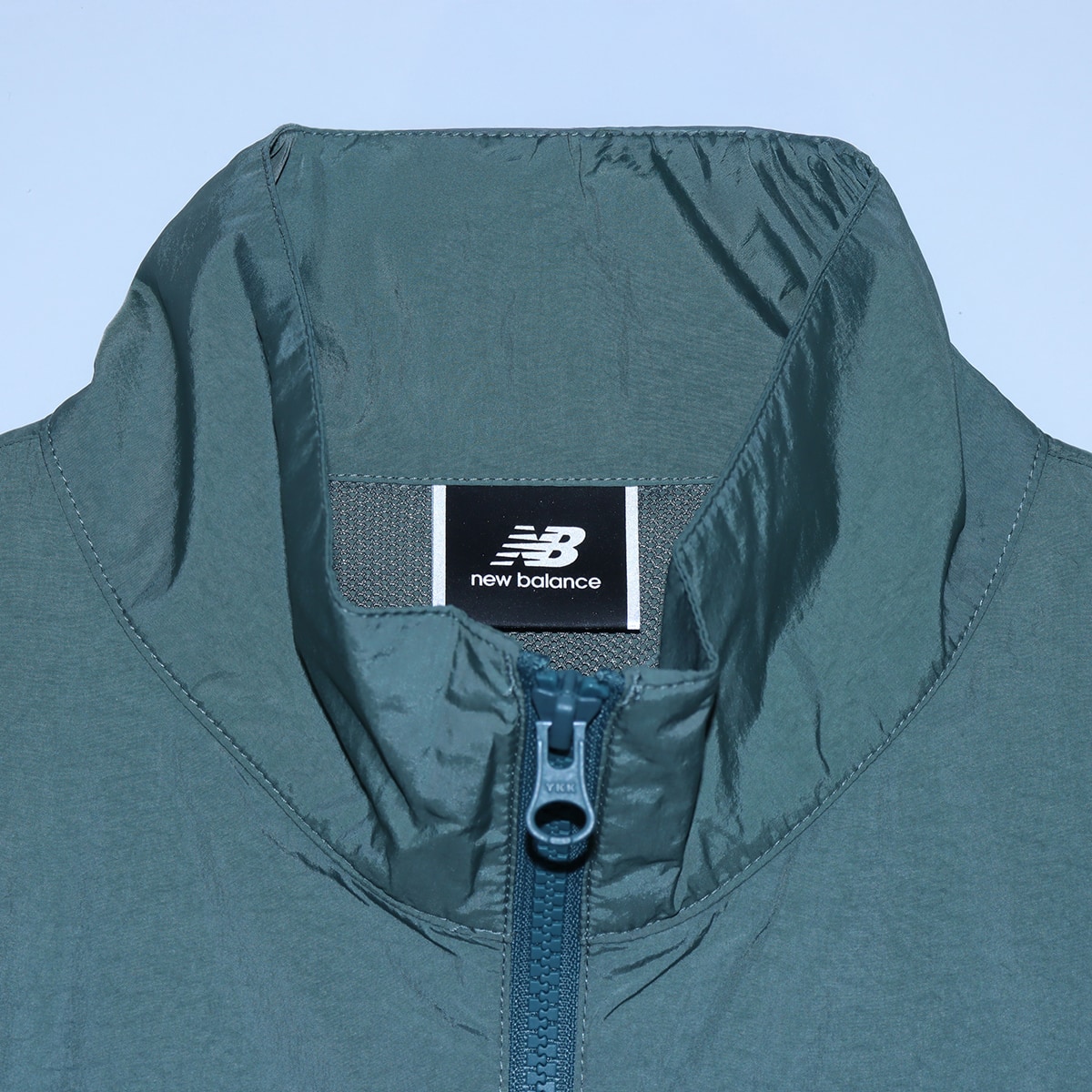 New Balance MET24 Varsity Jacket ダークジュ二パー