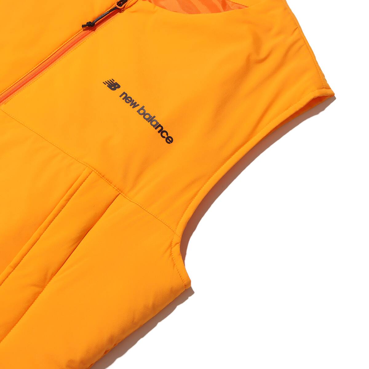 New Balance MET24 Packable Padded Vest マリーゴールド 23FW-Iの画像