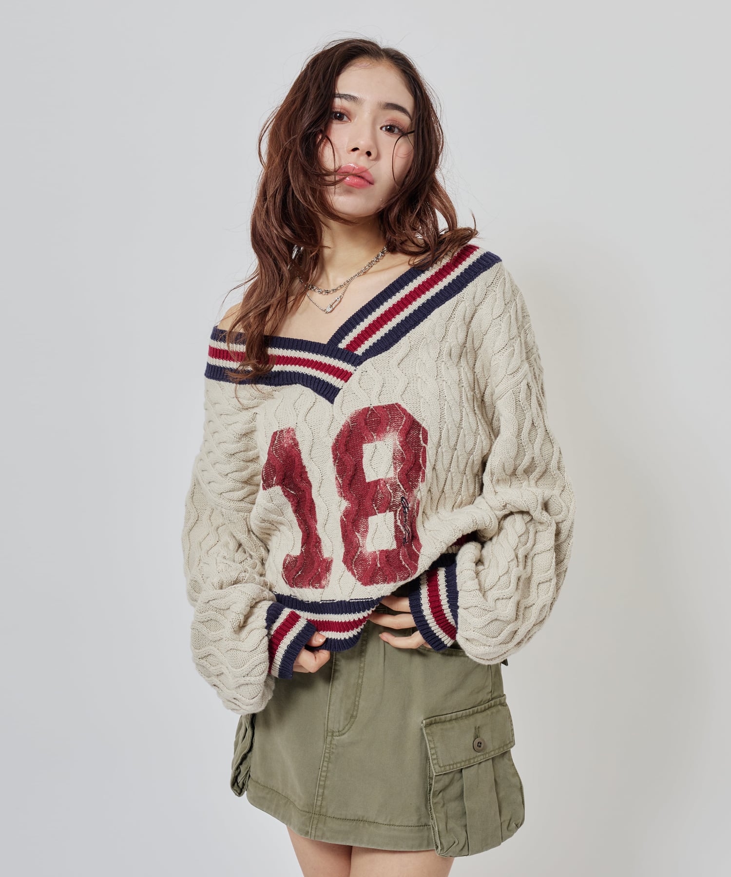 atmos pink Numbering Cable Knit Top OFF WHITEの画像