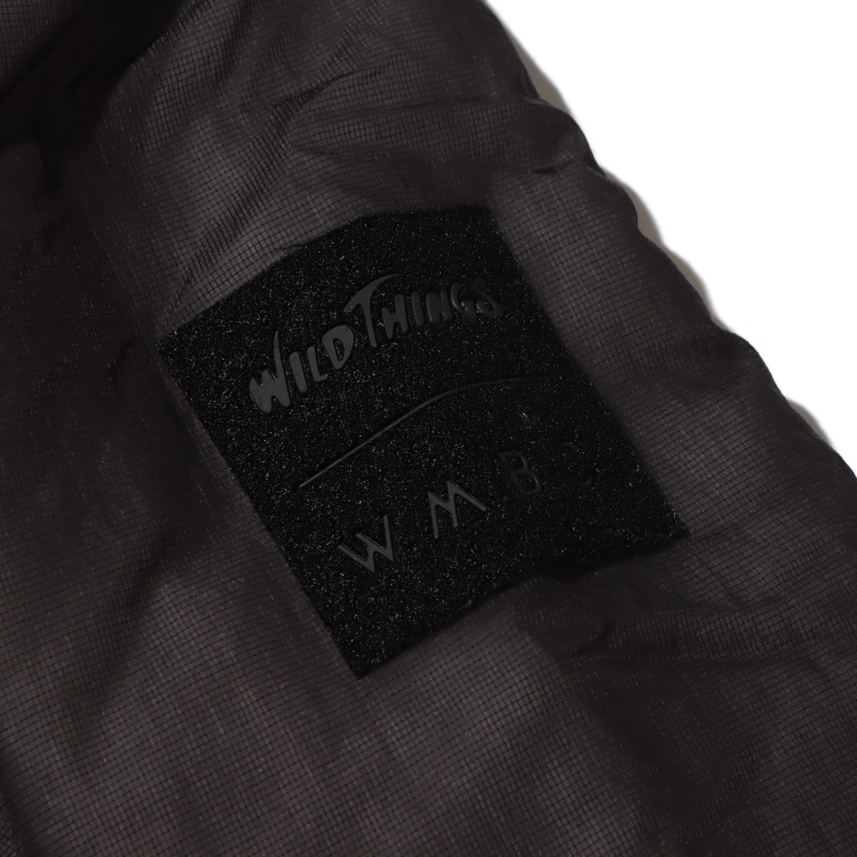 WHITE MOUNTAINEERING x WILD THINGS PRIMALOFT MONSTER PARKA BLACKの画像