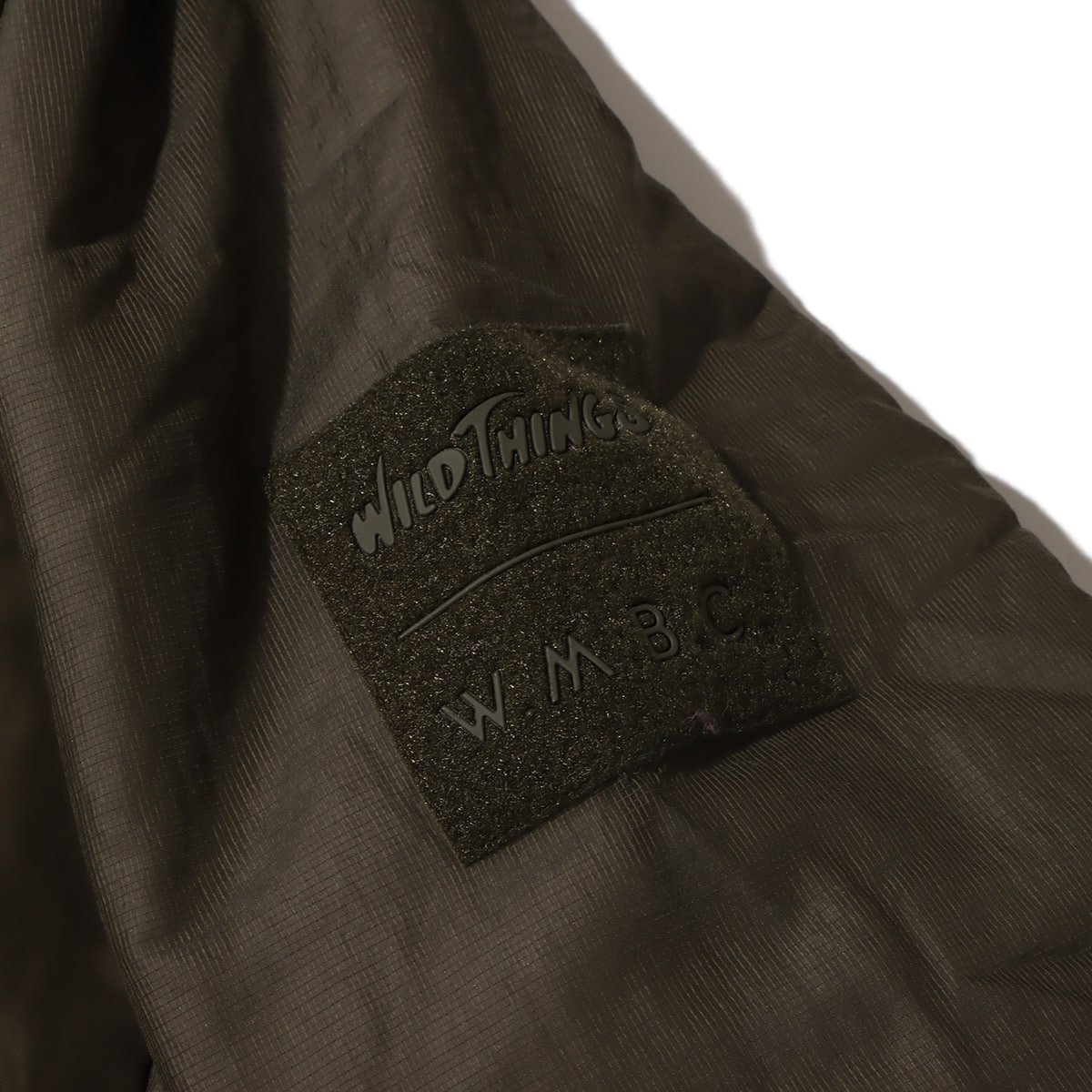 WHITE MOUNTAINEERING x WILD THINGS PRIMALOFT MONSTER PARKA WHITE MOUNTAINEERING x WILD THINGS PRIMALOFT MONSTER PARKA