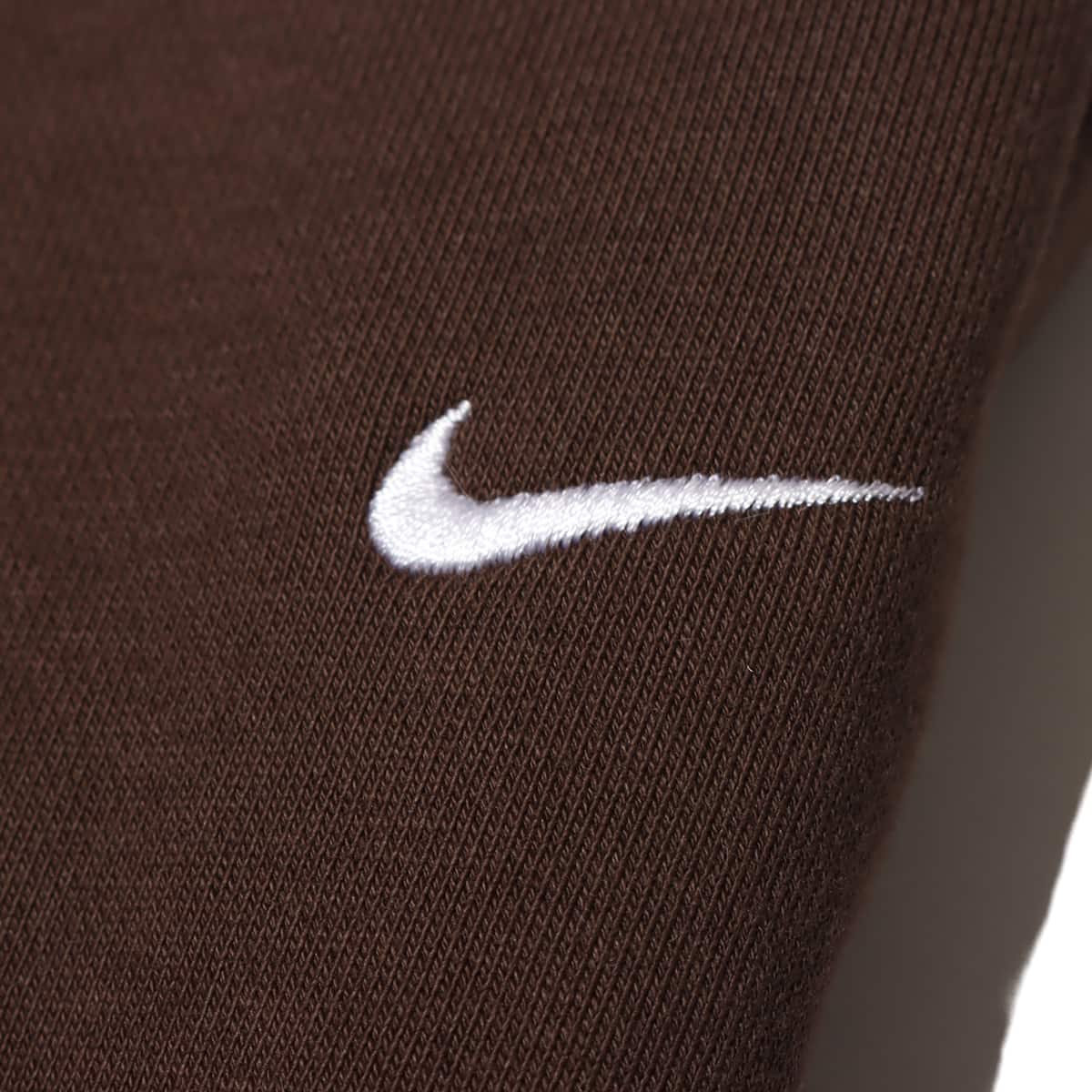NIKE AS W NRG SOLO SWSH FLC PANT BAROQUE BROWN/WHITEの画像