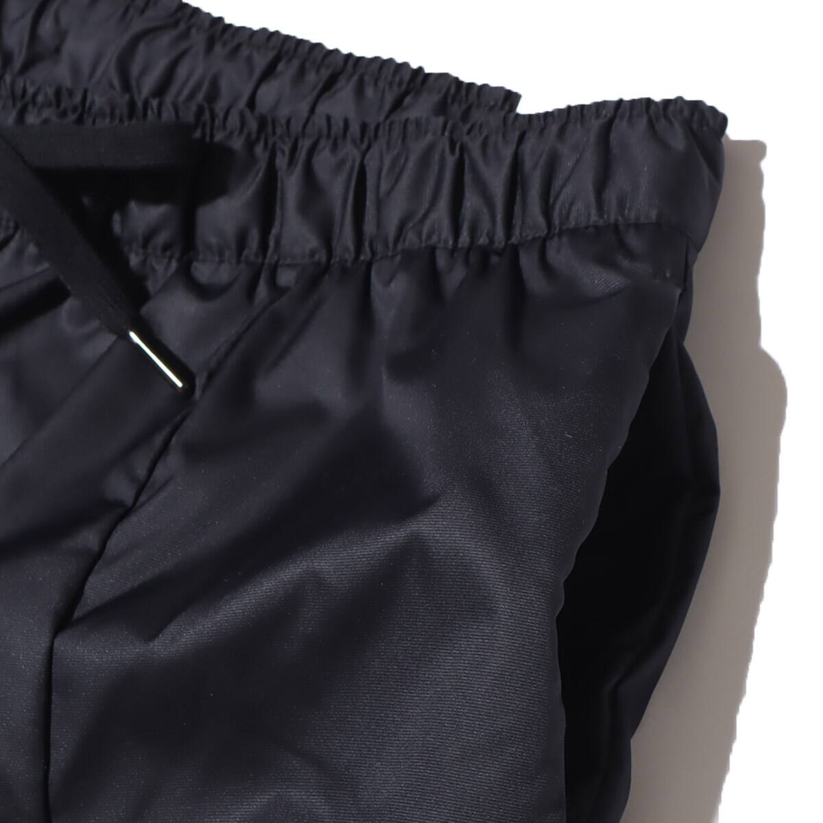 NIKE AS W NSW WVN MR PANT AMD BLACK/WHITE 22SP-Iの画像