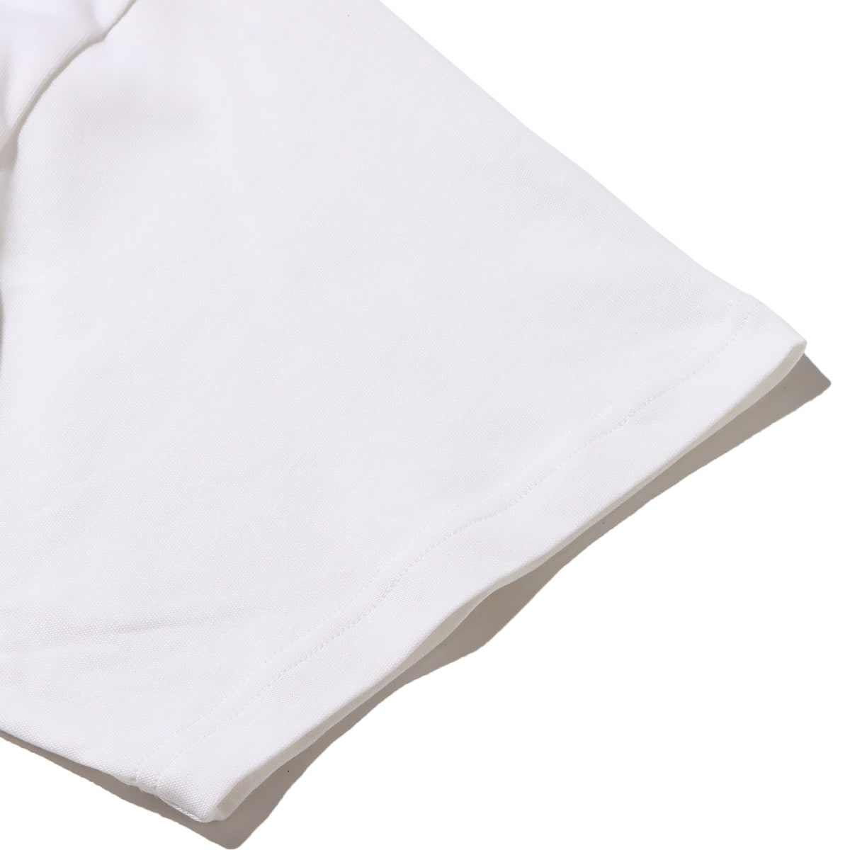 NIKE U NK NRG ARGON SS WHITE 22FA-Sの画像