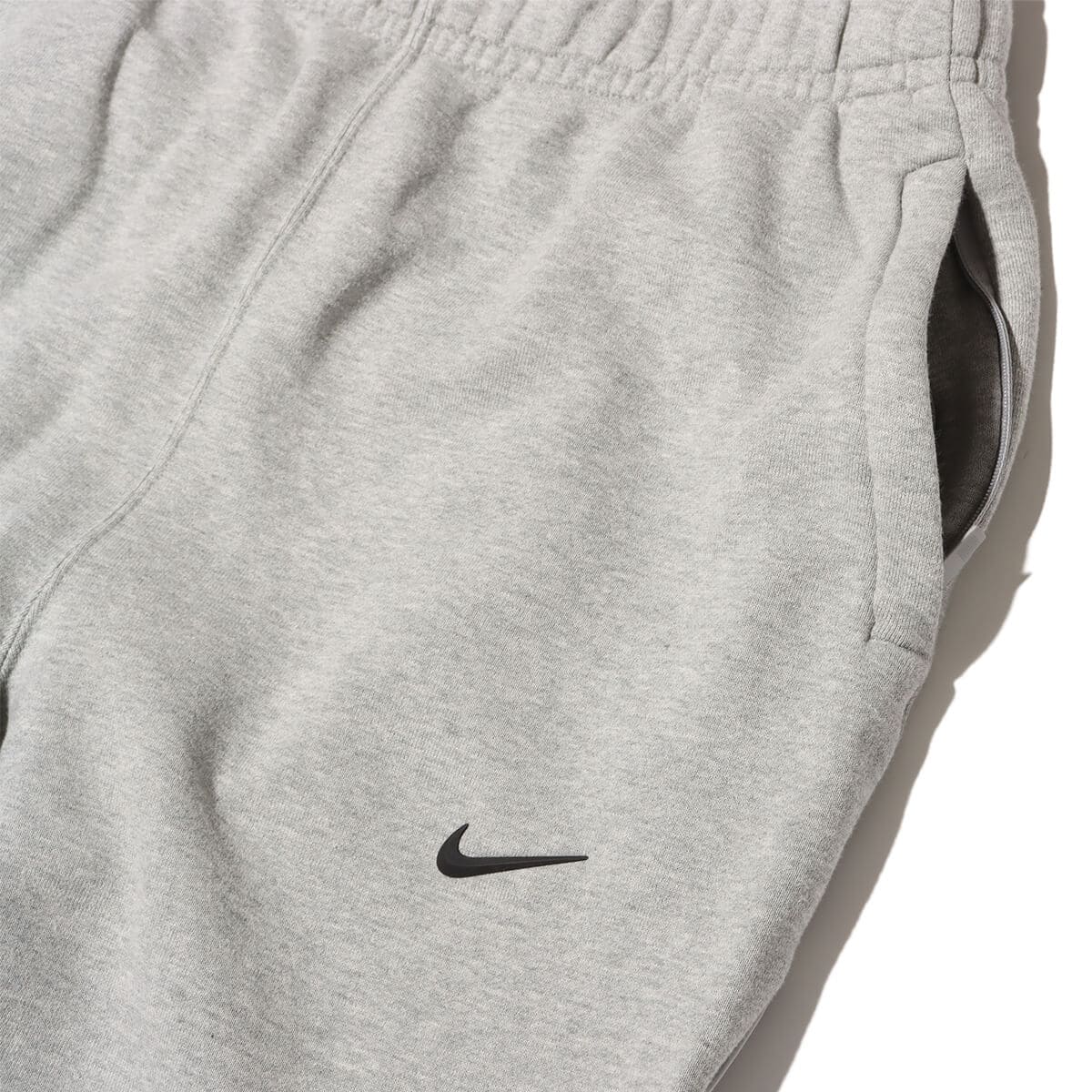 NIKE M NRG NOCTA CS PANT FLC DK GREY HEATHER/MATTE SILVER
