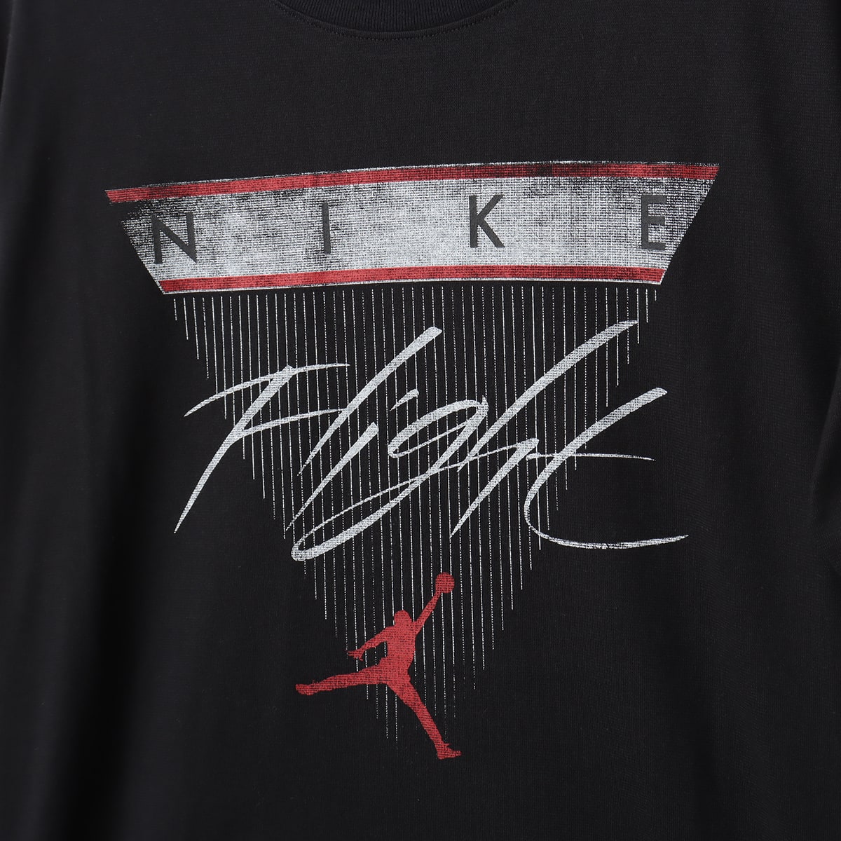 JORDAN BRAND AS W J SS GF GFX FLT TEE BLACK/GYM REDの画像