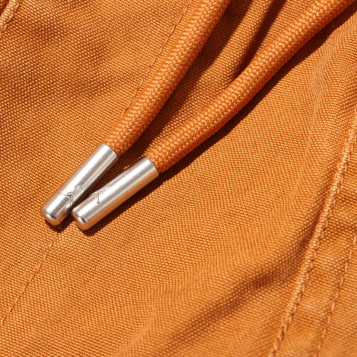 JORDAN BRAND M J ESS STMT WVN SHORT DESERT BRONZE の画像