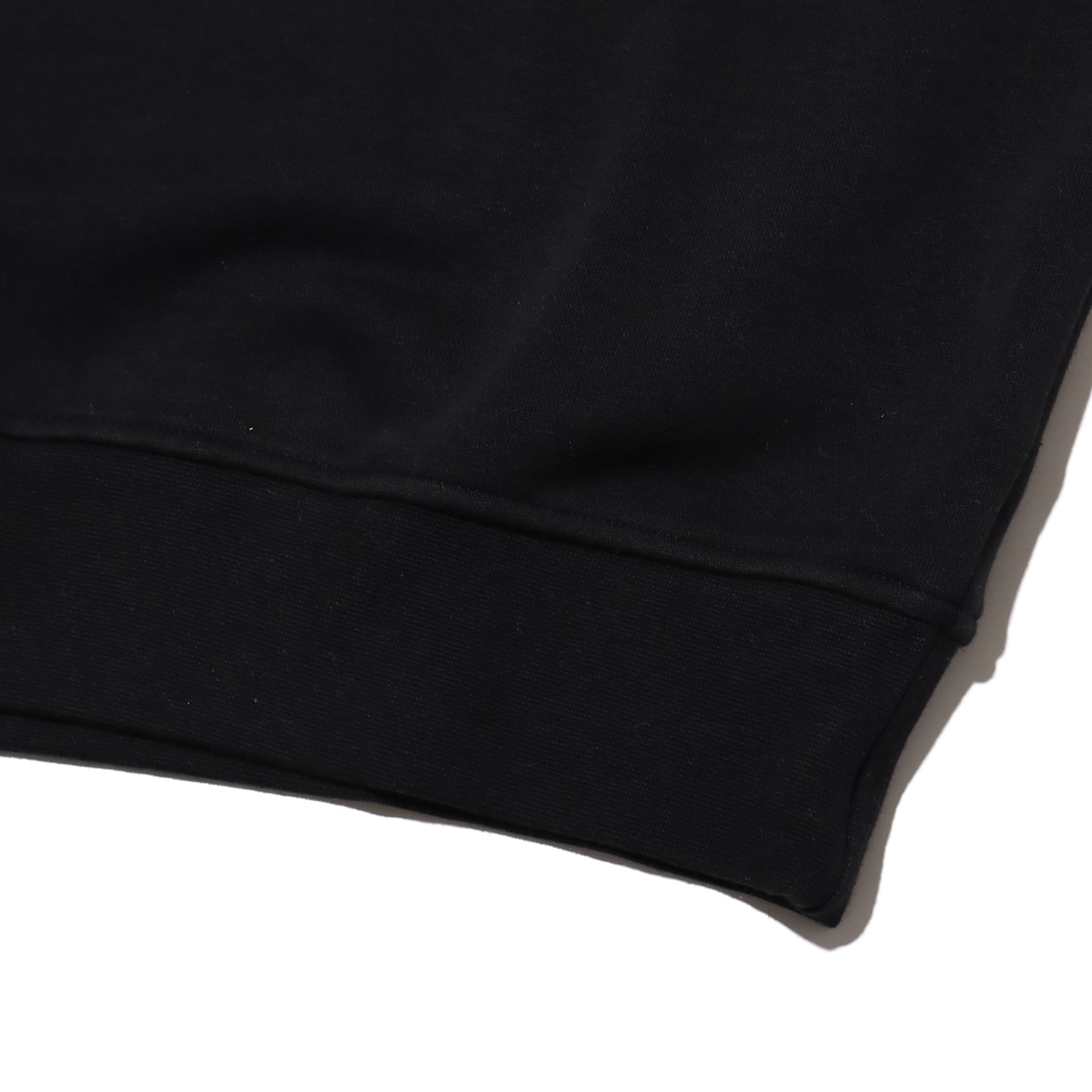 JORDAN BRAND M J ESS HLDY FLC CREW BLACK/SAIL の画像