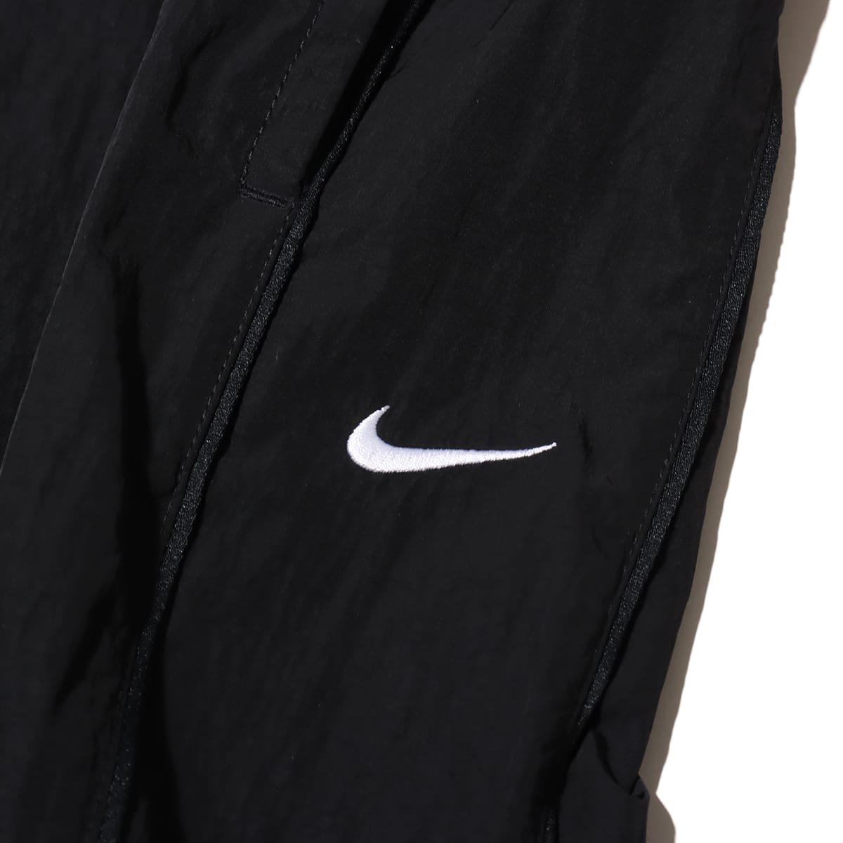 NIKE AS WOMENS NSW WIND RUNNER HIGH-WAIST WOVEN OPEN HEM PANTS BLACK/WHITE