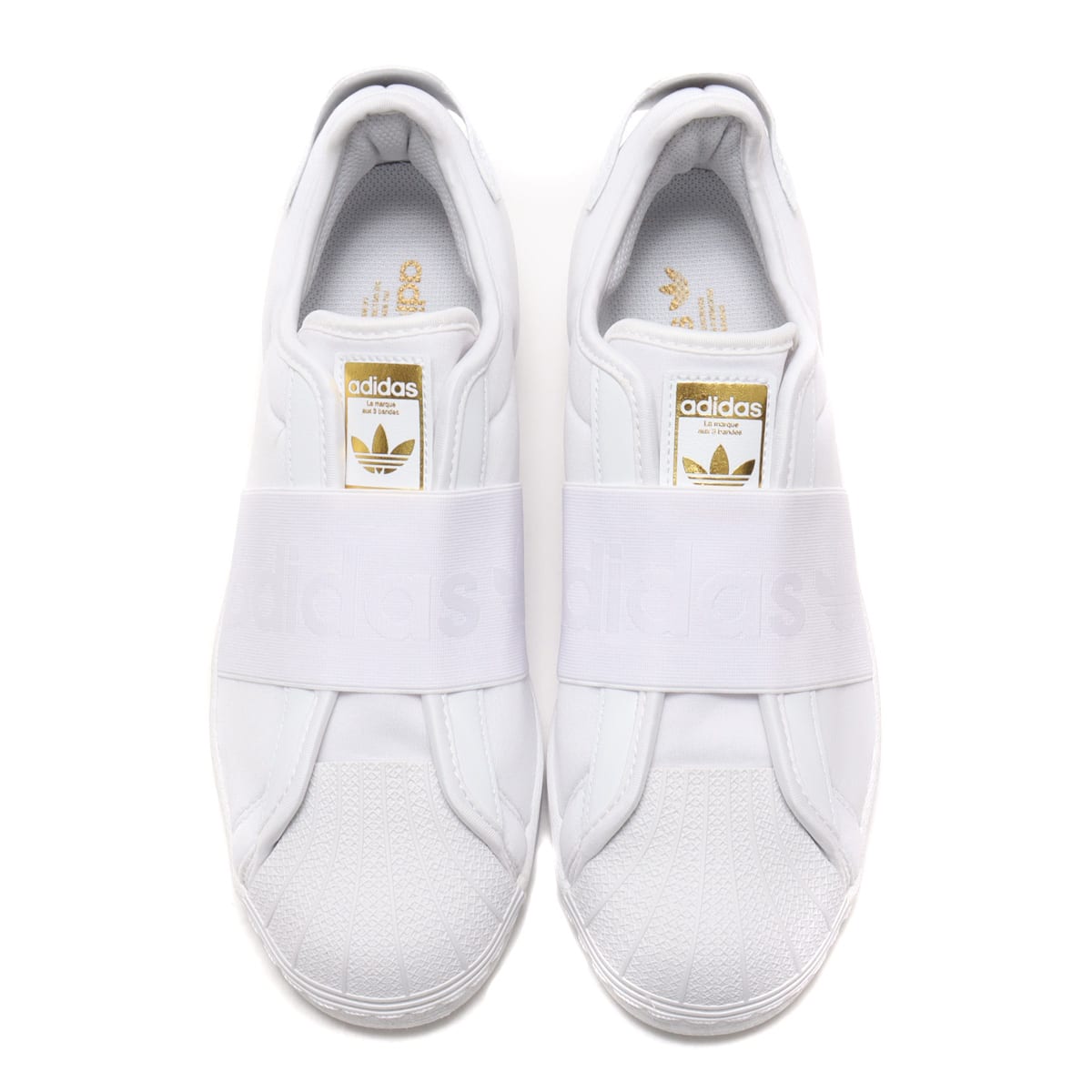 Adidas superstar slip on hotsell triple white