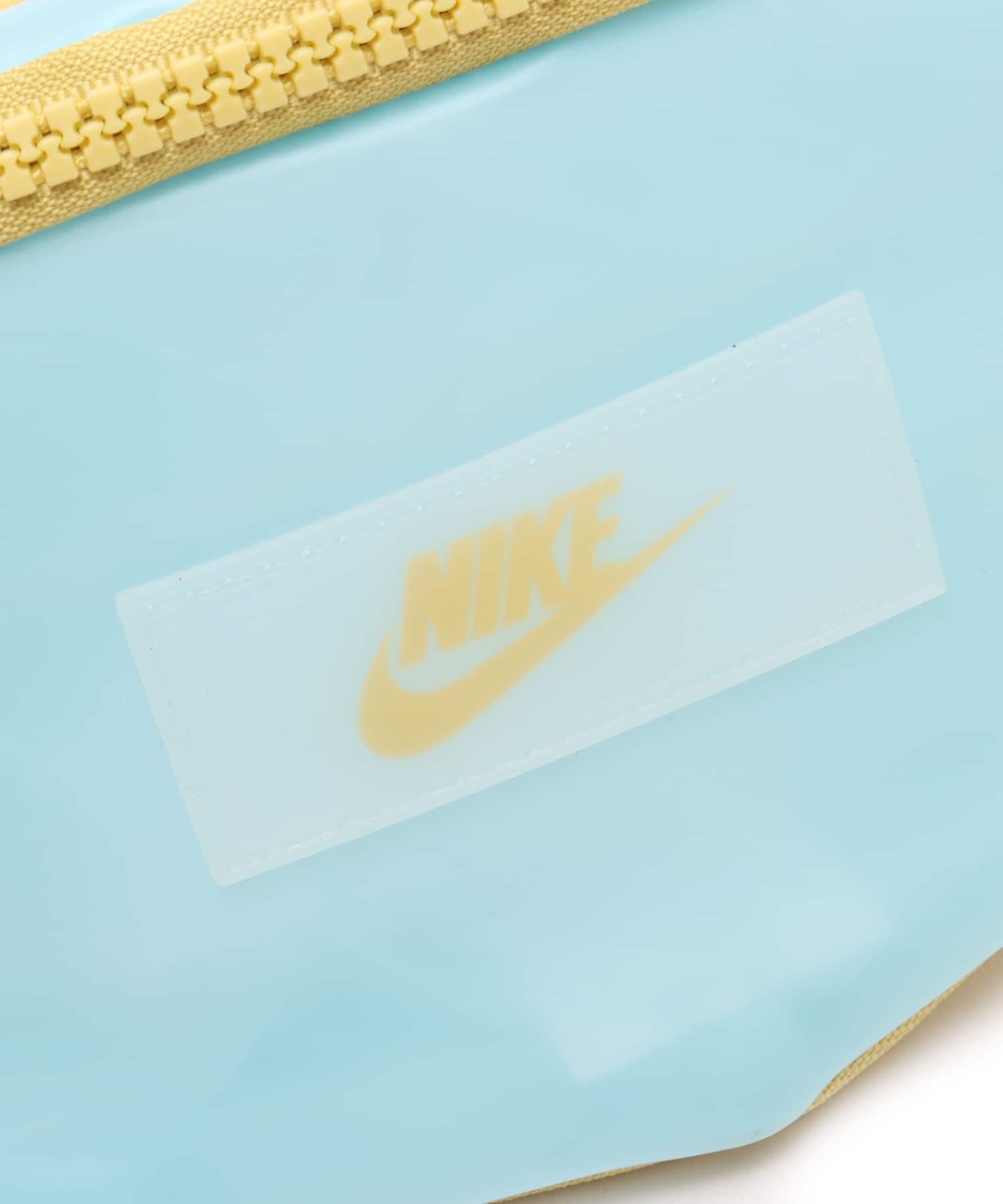 NIKE NK HERITAGE S WSTPCK - JELLY GLACIER BLUE/SATURN GOLD/SATURN GOLDの画像