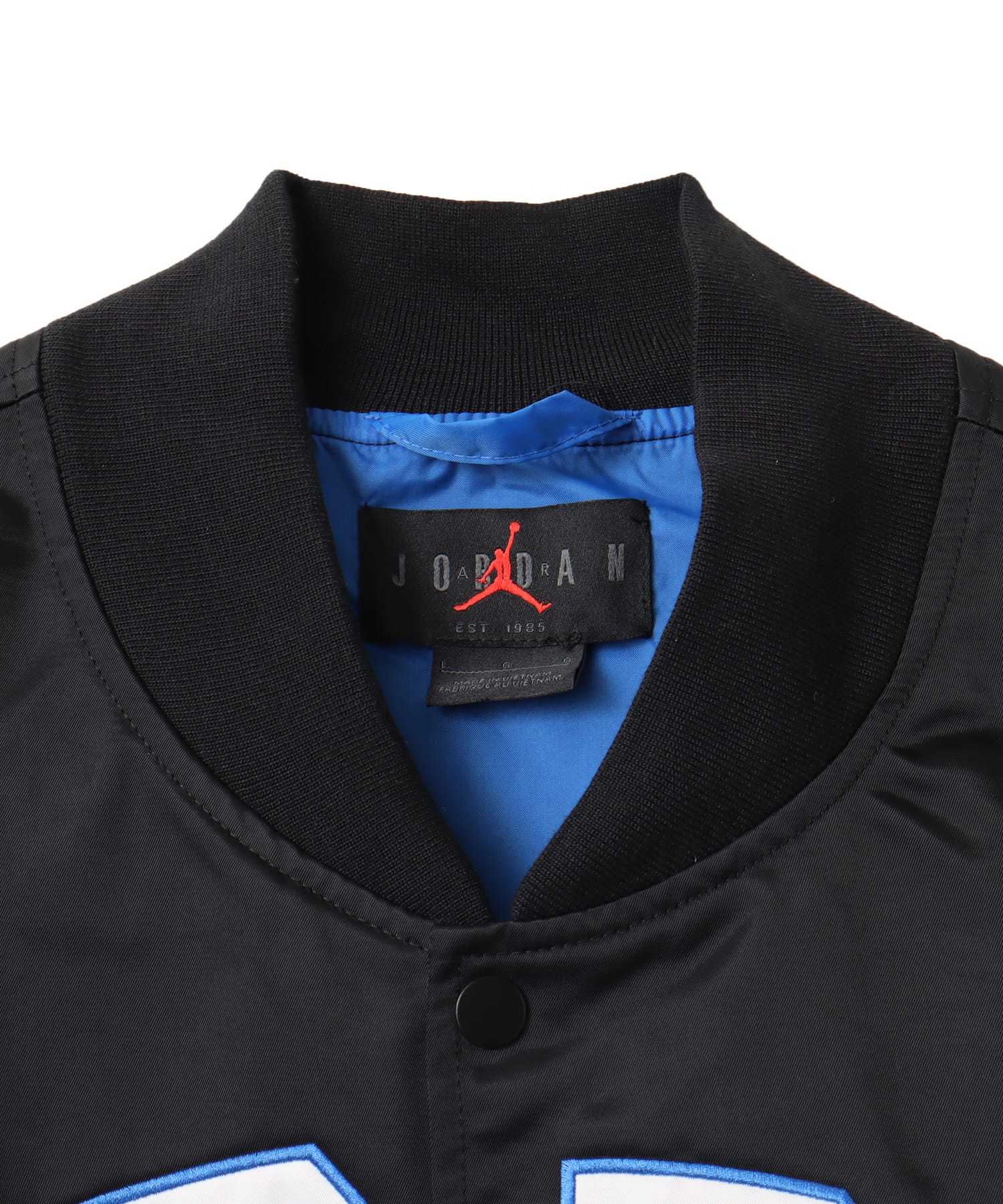 JORDAN BRAND M J BRK CLGTE VRSTY JKT BLACK/SPORT BLUE/BLACKの画像