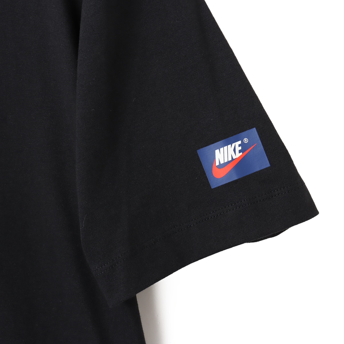 JORDAN BRAND M J FLT ESS VTG AJ1 SS CREW BLACK/SAILの画像