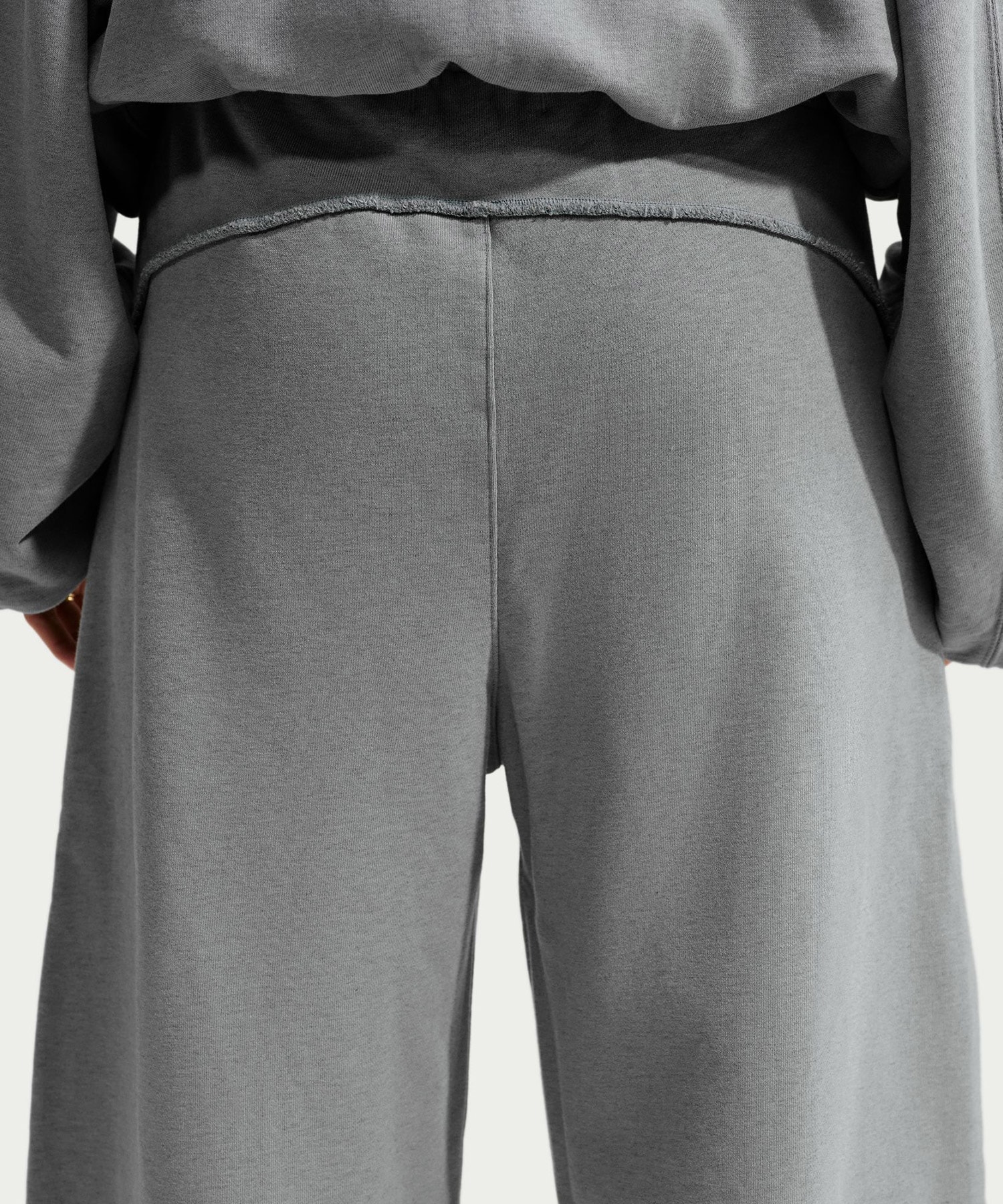 NIKE W NRG NK STUDIO FLEECE PANT COOL GREY HTRの画像