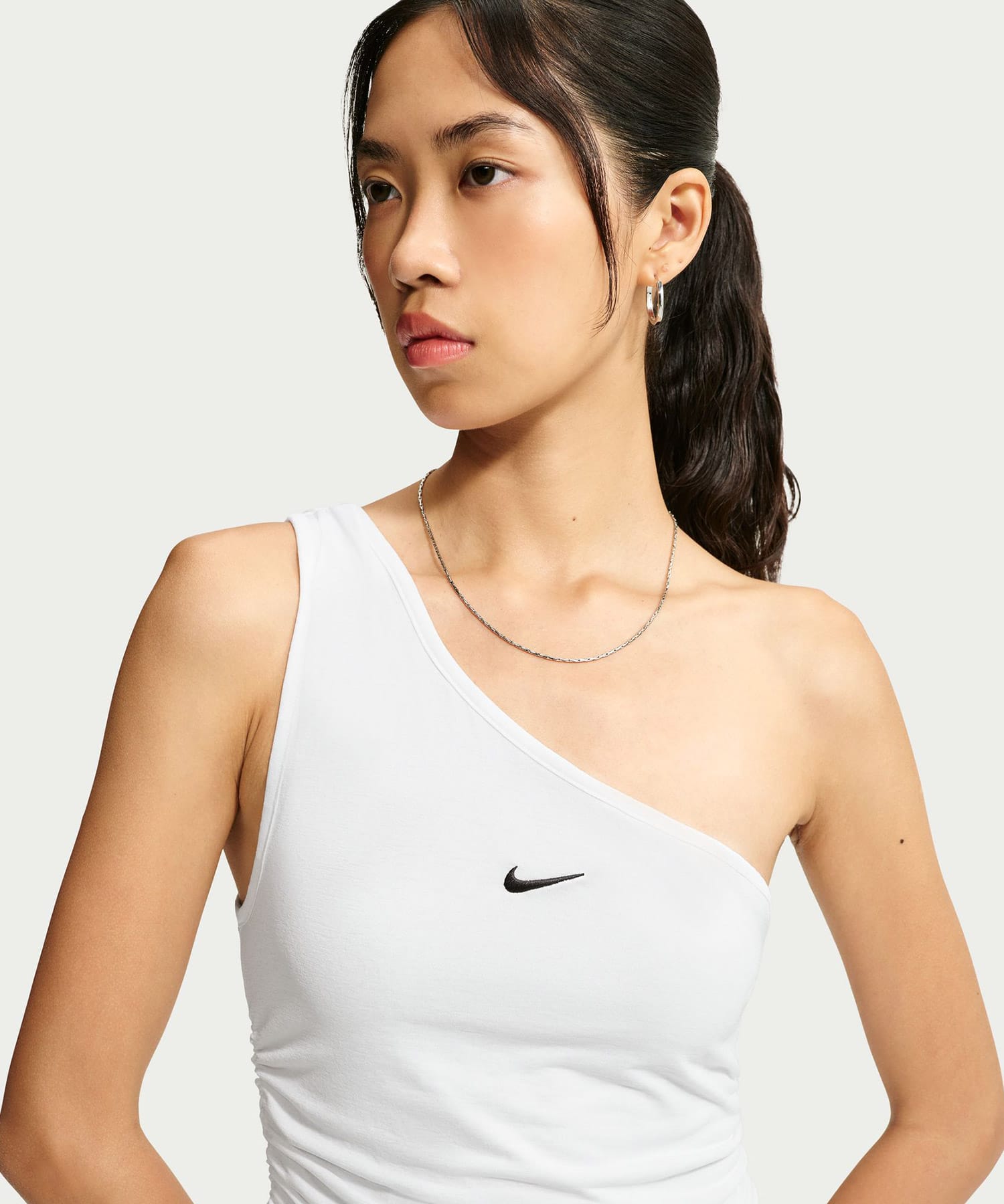 NIKE AS W NK ASSYM ONE SHOULDER TAN WHITEの画像