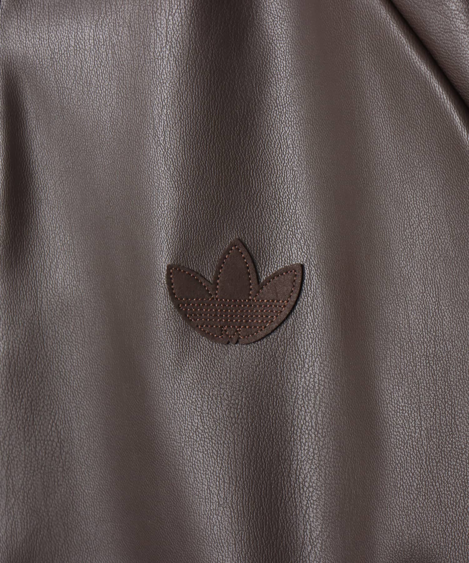 adidas SST PLEATHER TRACK TOP ダークブラウンの画像