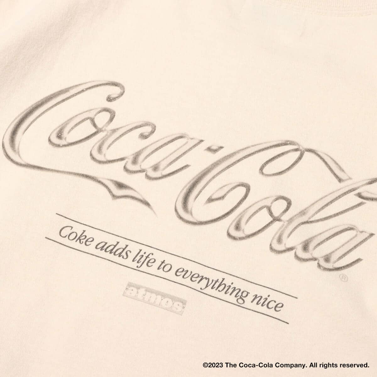 Coca Cola | atmos Metallic Logo T-shirts IVORYの画像