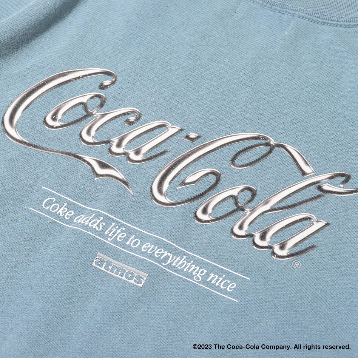 Coca Cola | atmos Metallic Logo T-shirts NAVYの画像