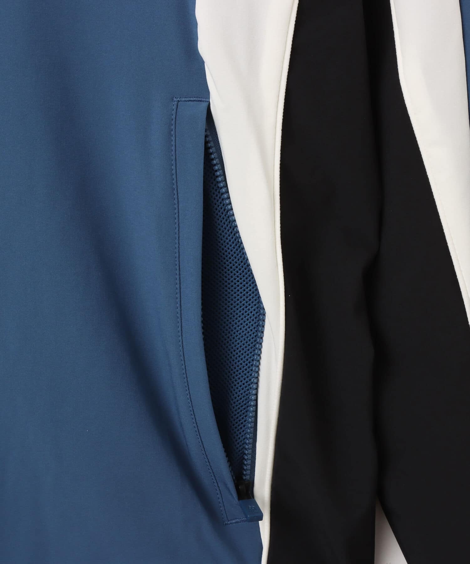 New Balance IN GAME WOVEN TRACK JACKET ダークショアラインブルーの画像