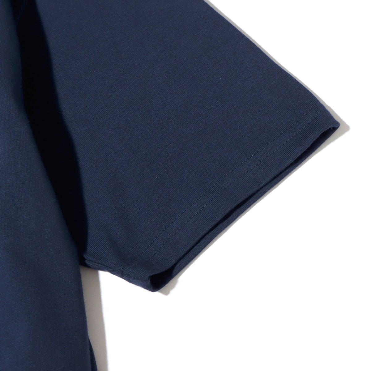 New Balance ATHLETICS ARTIST LEVITZO TEE 2 NATURAL INDIGO 21FW-Iの画像