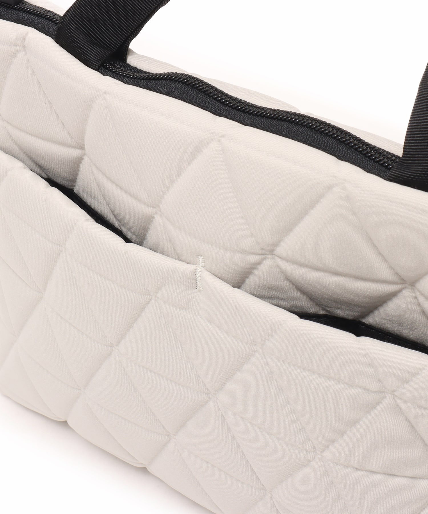 THE NORTH FACE Geoface Box Tote フォッシルアイボリーの画像