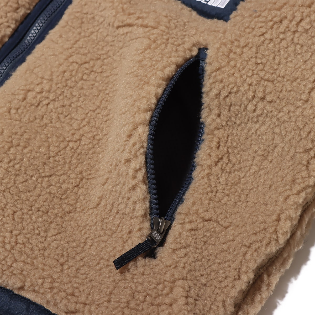 THE NORTH FACE REVERSIBLE EXTREME PILE CARDIGAN KTXUN の画像