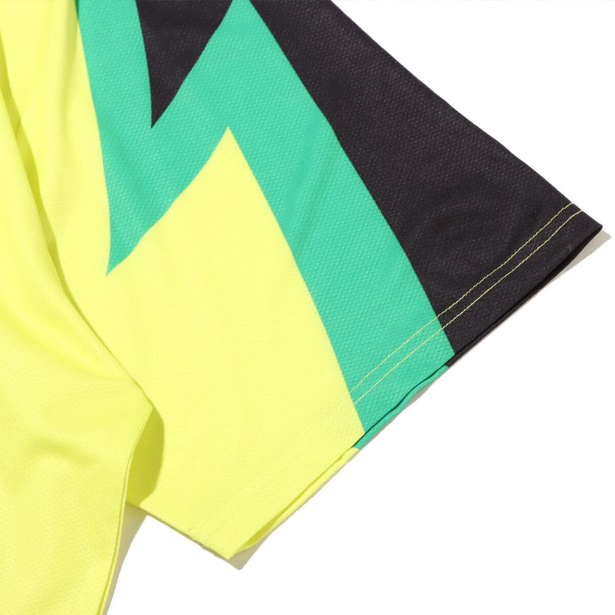 PLEASURES MIND SOCCER JERSEY LIMEの画像