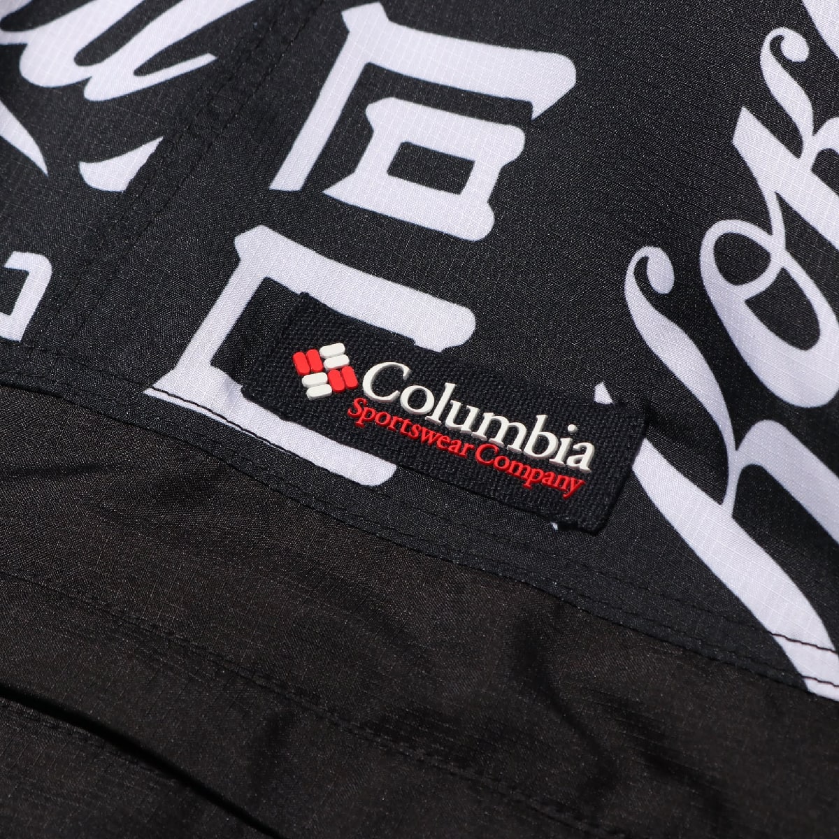 COCA-COLA x Columbia x ATMOS LAB WOLF ROAD TXT JACKET BLACK 20SP-S