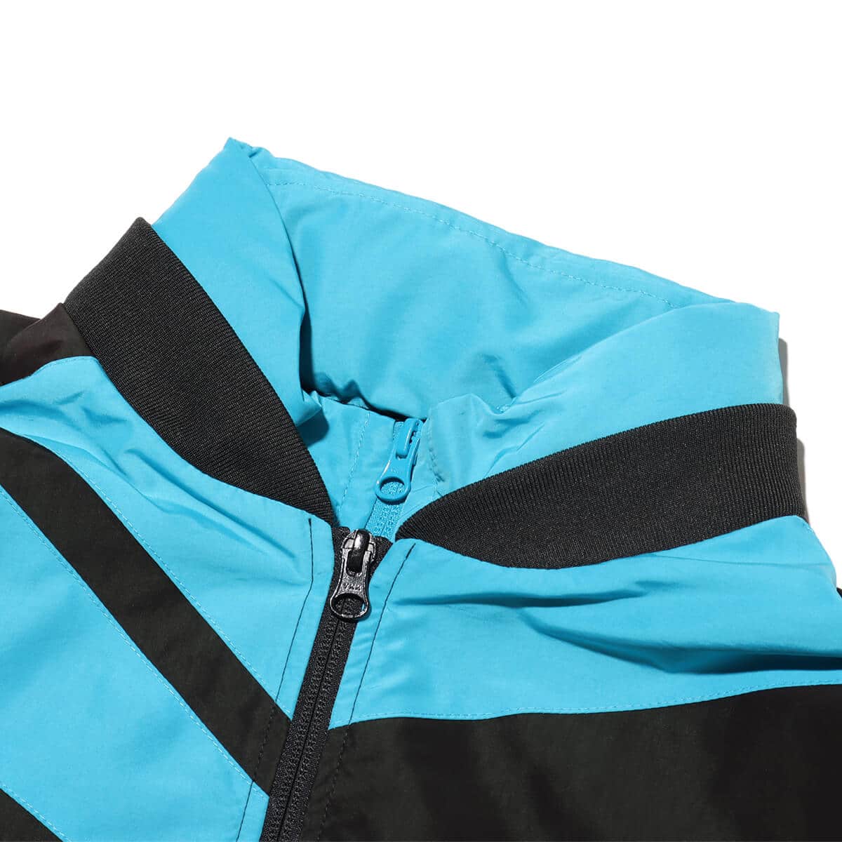 Reebok BOTTER VECTOR TRACK JACKET BLACK/BLUEの画像
