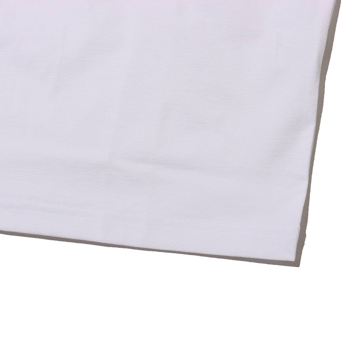 UMBRO BACK LETTERING SHORT SLEEVE SHIRT WHITE の画像