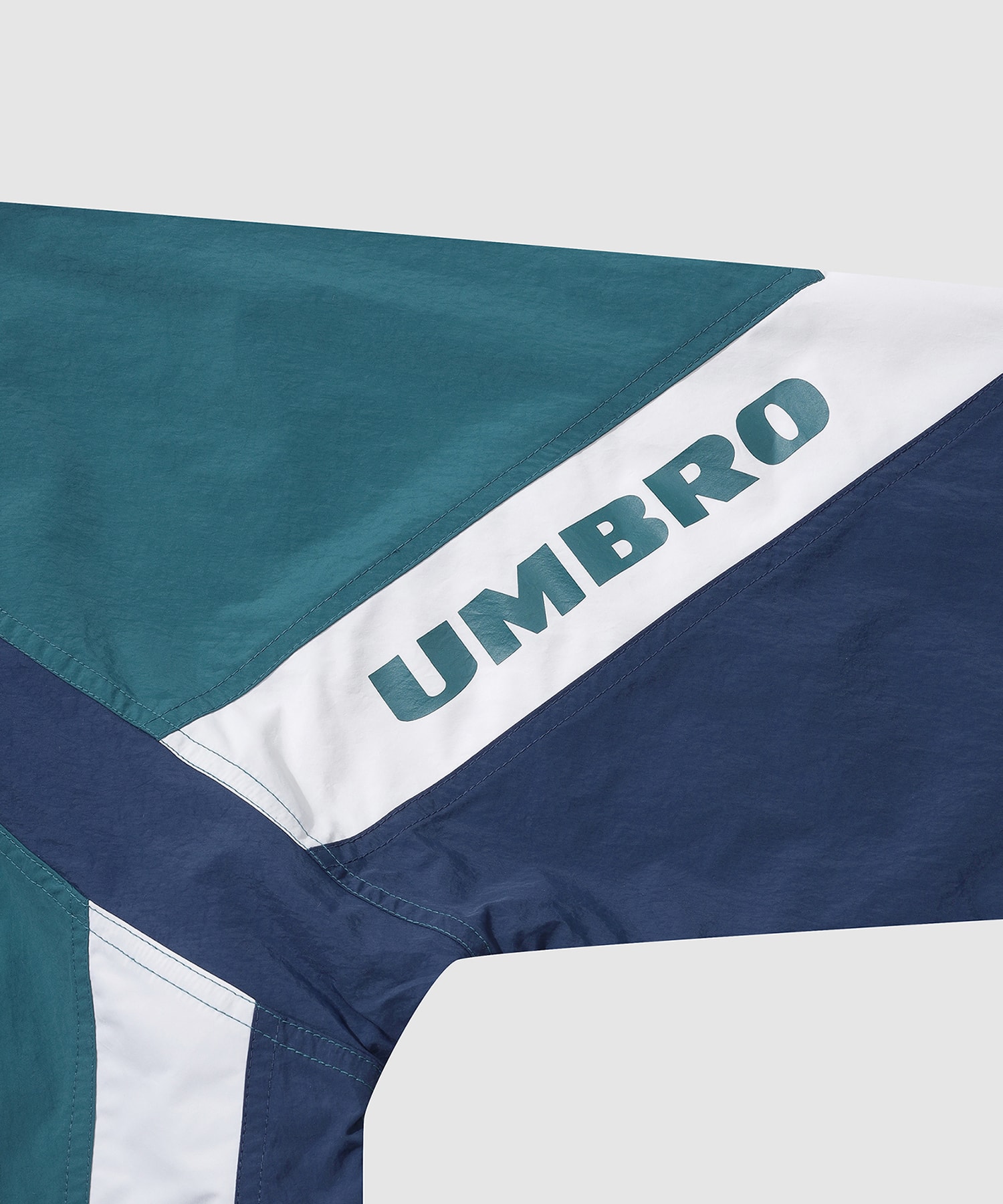 UMBRO 【KOREA COLLECTION】COLOR BLOCK STAND-NECK JACKET ブルーの画像