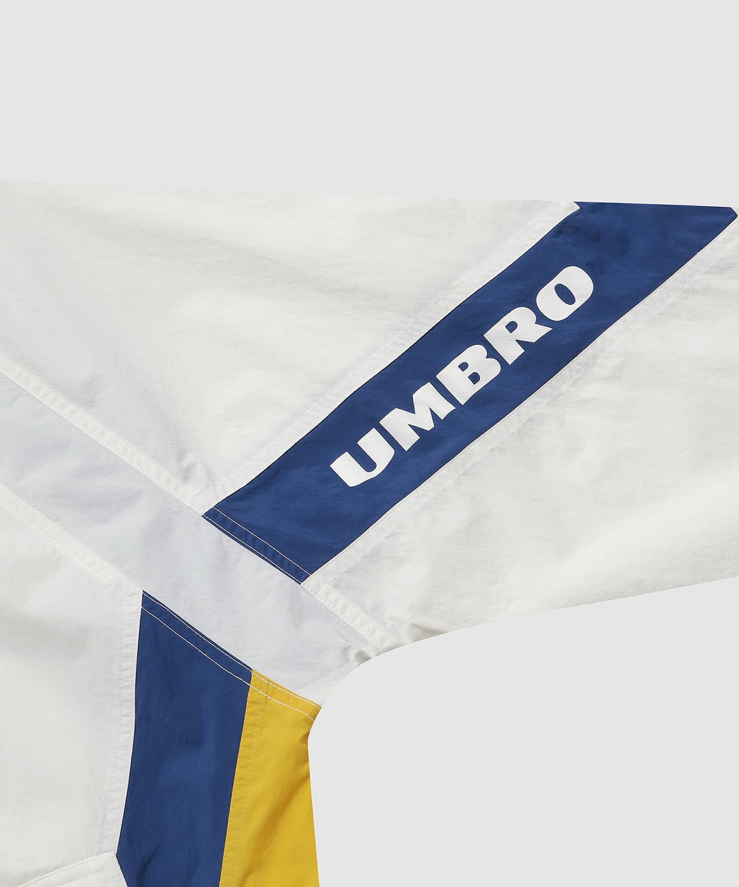 UMBRO 【KOREA COLLECTION】COLOR BLOCK STAND-NECK JACKET グレーの画像