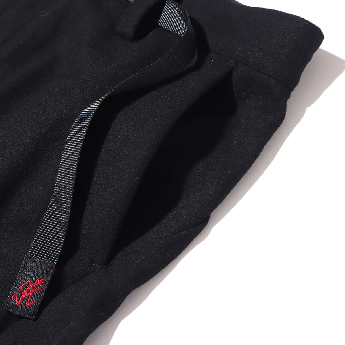 WHITE MOUNTAINEERING × GRAMICCI WOOL DARTED PANTS BLACK 21FA-Iの画像