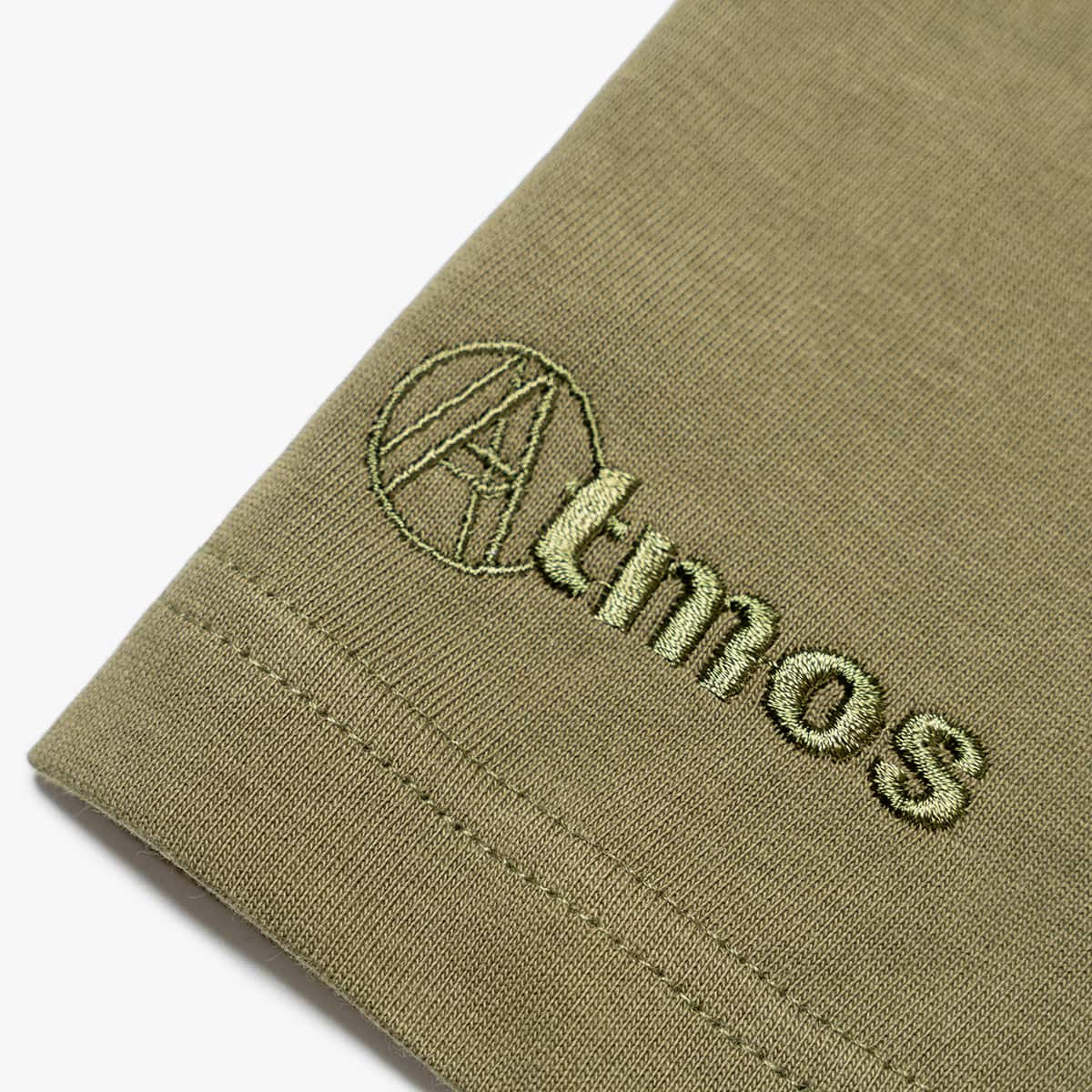 AGAINST LAB X ATMOS DRAGON LOGO TEE OLIVEの画像