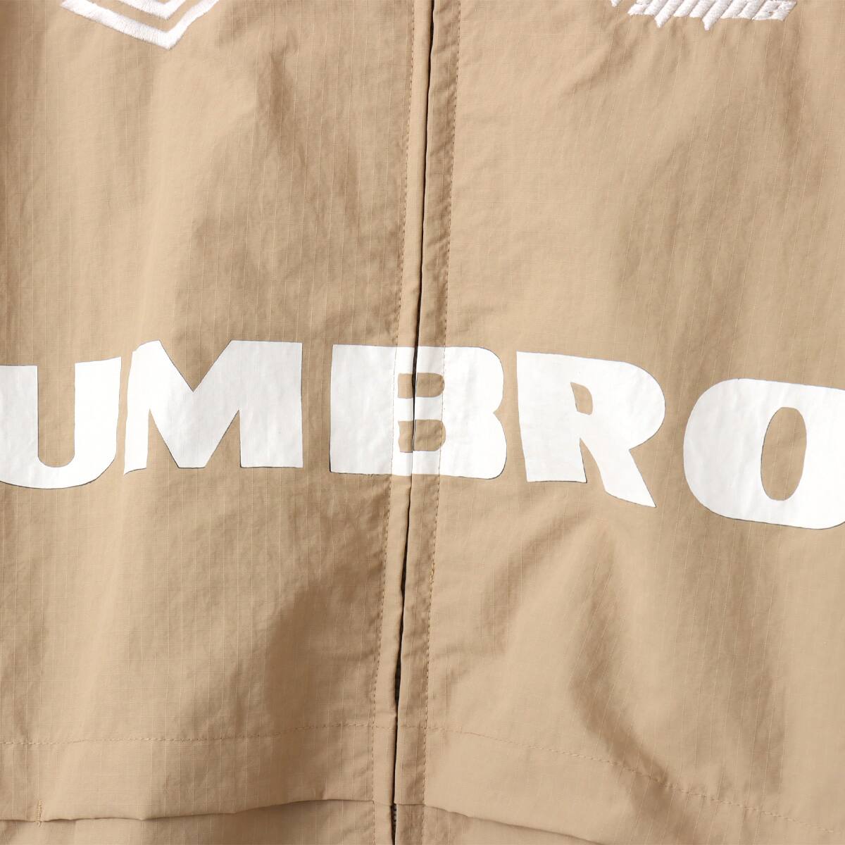 UMBRO × atmos pink Track Jacket BEIGEの画像