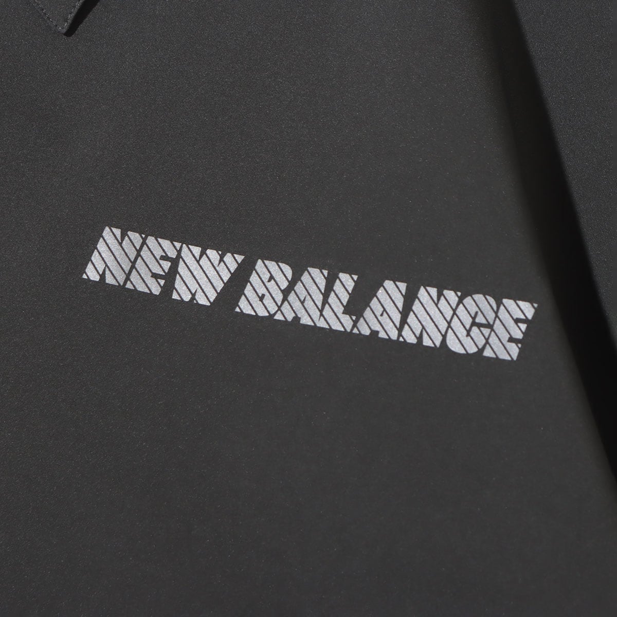 New Balance MET24 Coach Shirt Jacket BLACK TOP 23SS-Sの画像