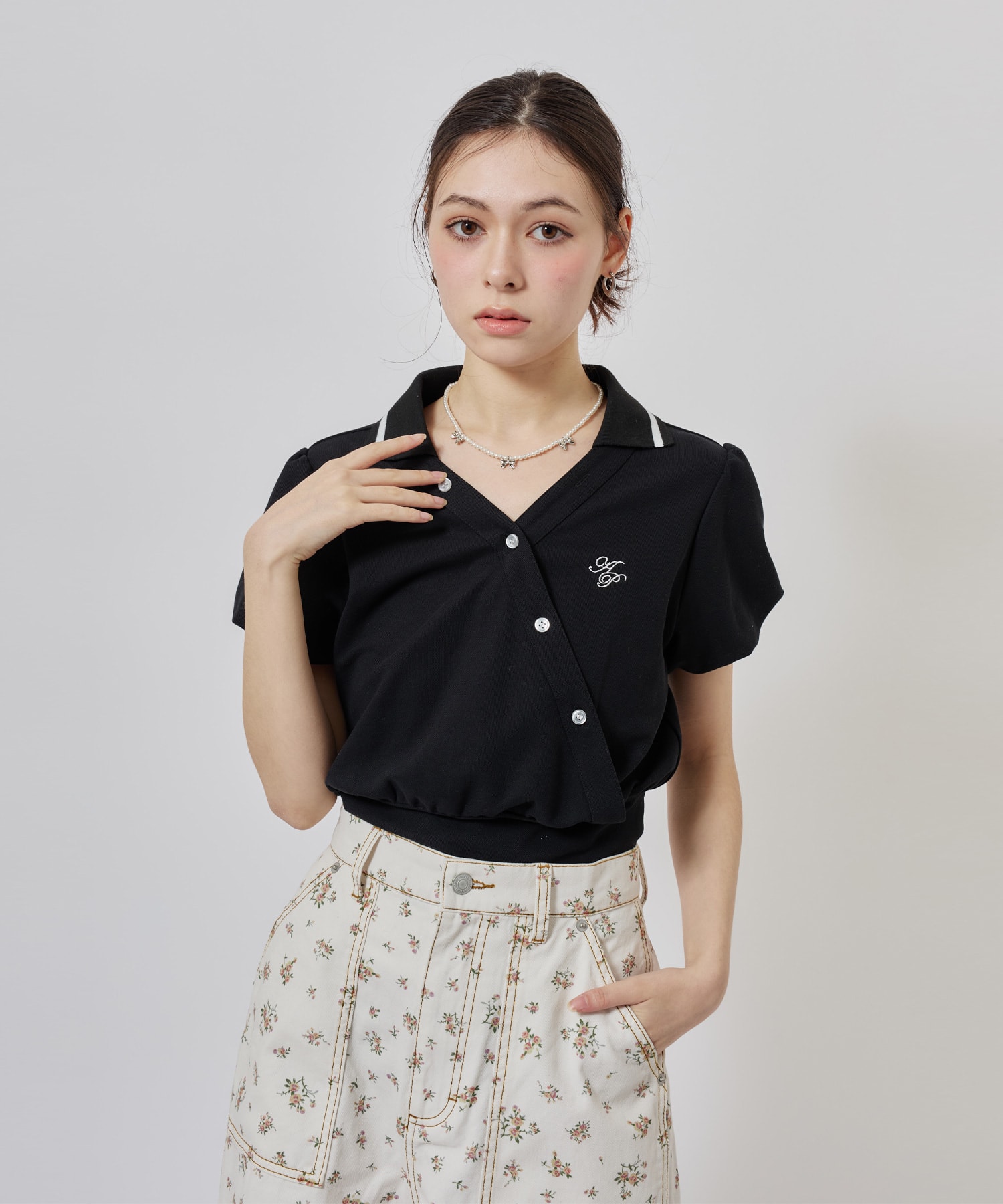 atmos pink Cashe-Coeur Polo Shirt BLACKの画像