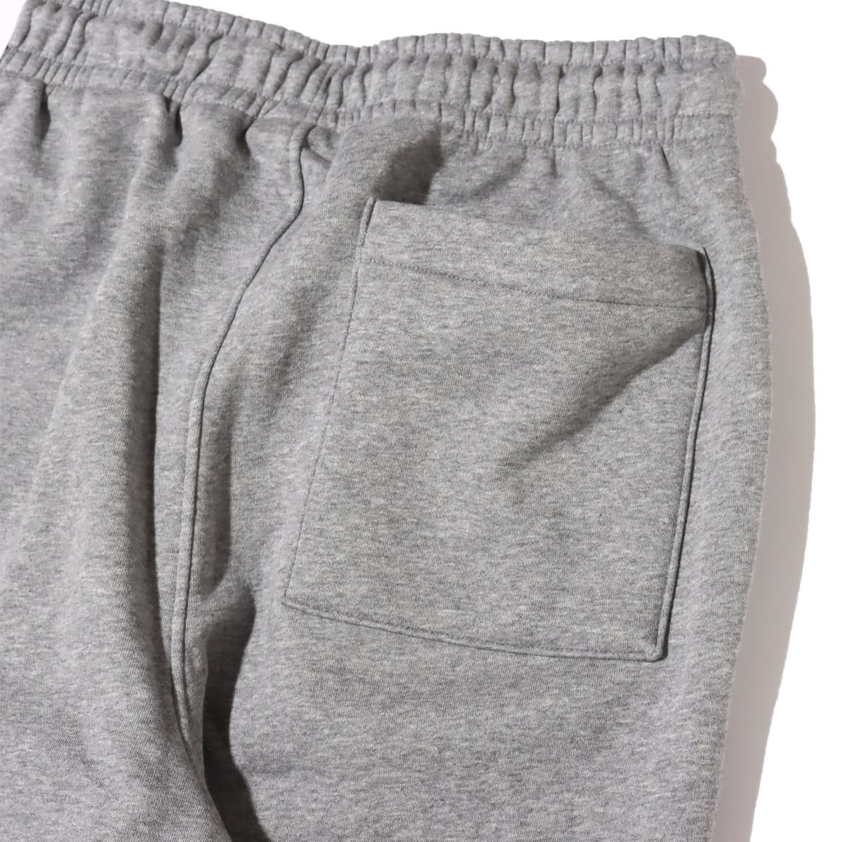 JORDAN BRAND AS M J ESS FLC PANT CARBON HEATHER/BLACK/WHITE 23SP-Iの画像