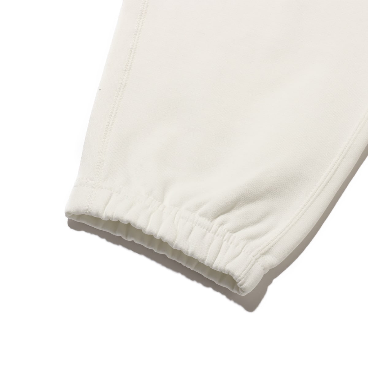 NIKE AS M NK SOLO SWSH FLC CF PANT SAIL/WHITE 24SP-Iの画像
