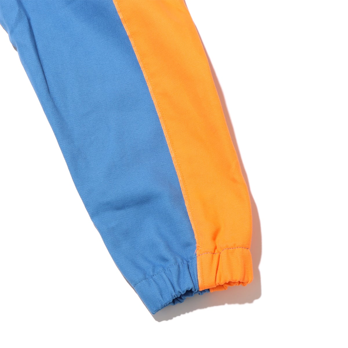 NIKE AS W NSW STREET OS ANORAK JKT STAR BLUE/BRIGHT MANDARIN