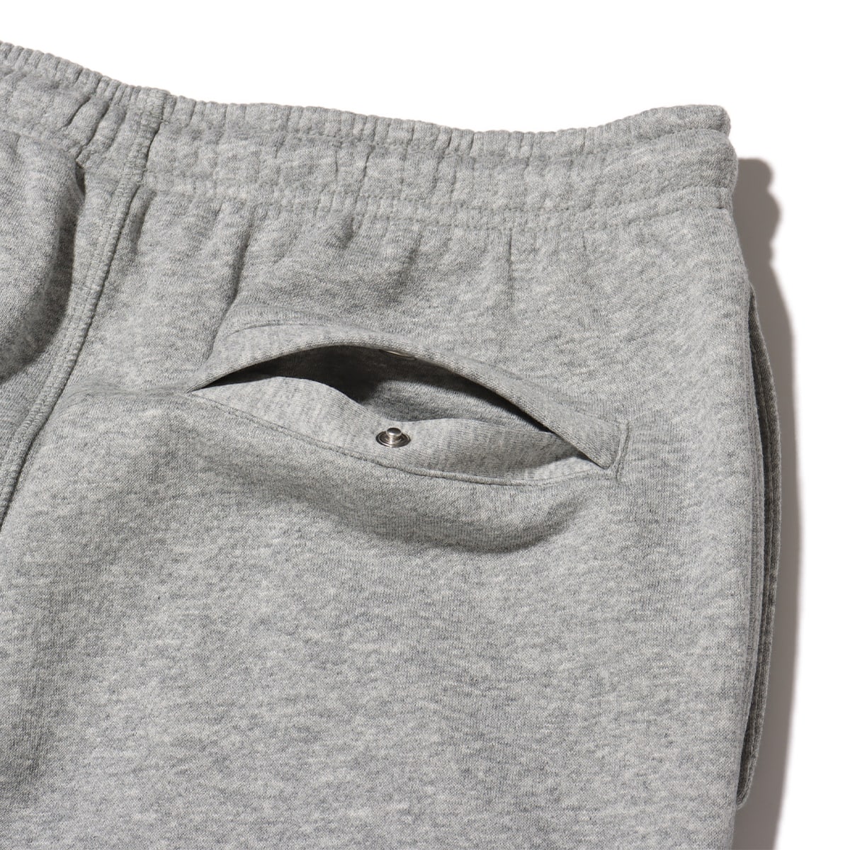 NIKE AS M NK CLUB BB JOGGER CHNL FT DK GREY HEATHER/LT SMOKE