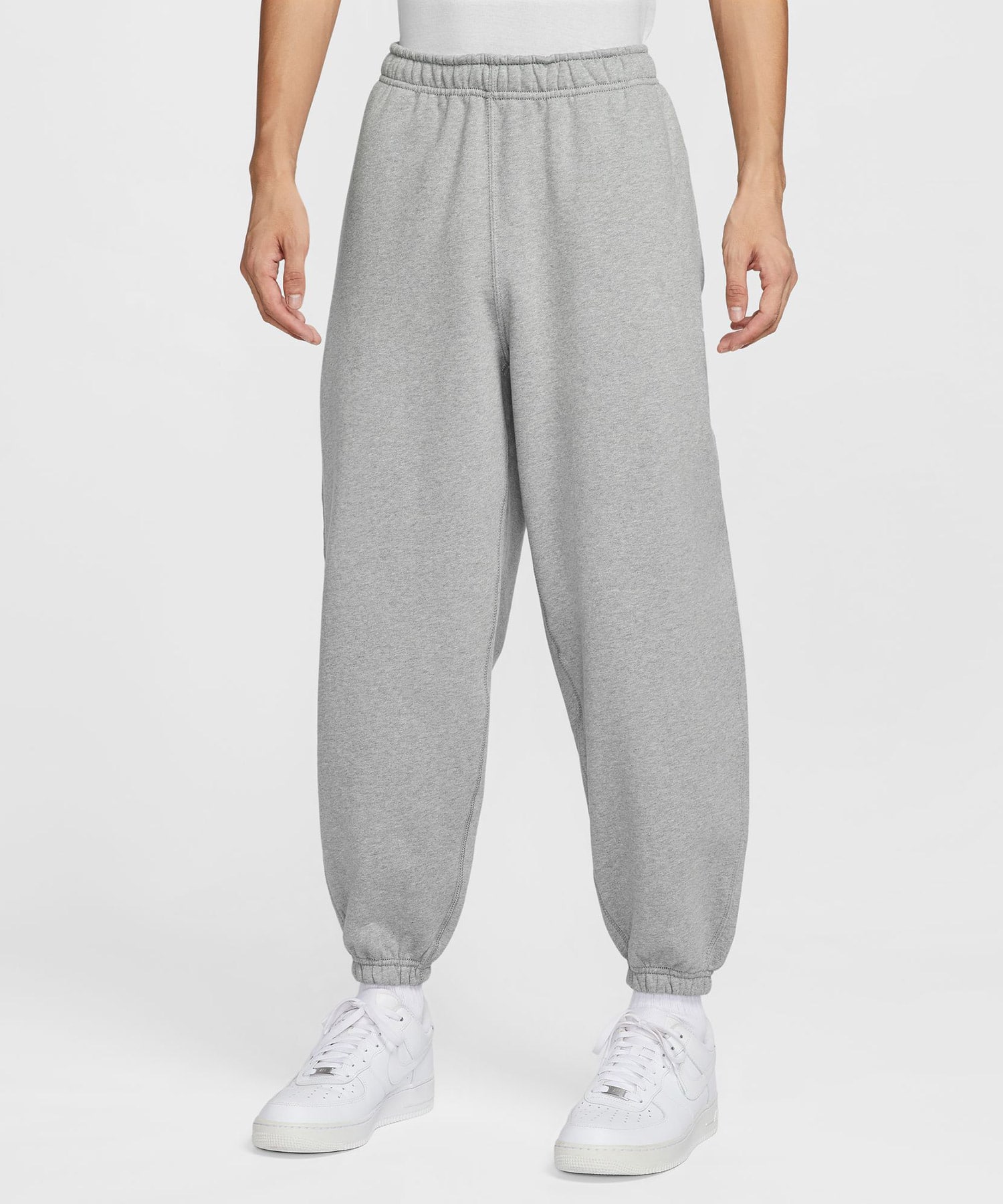 NIKE AS M NL SOLO SWSH BB CF PANT DK GREY HEATHER/LT SMOKE GREY/WHITEの画像
